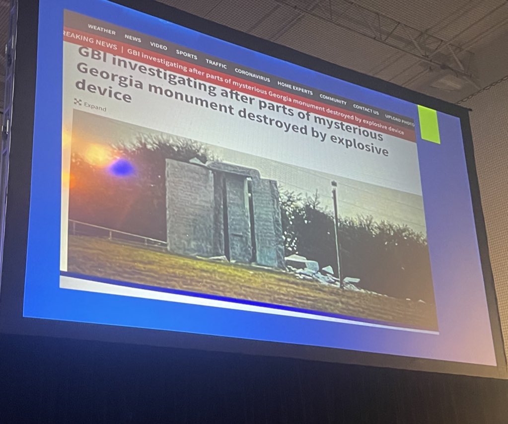 Crowd cheering the bombing of the Georgia Guidestones during a presentation by QAnon conspiracist Sheila Holm