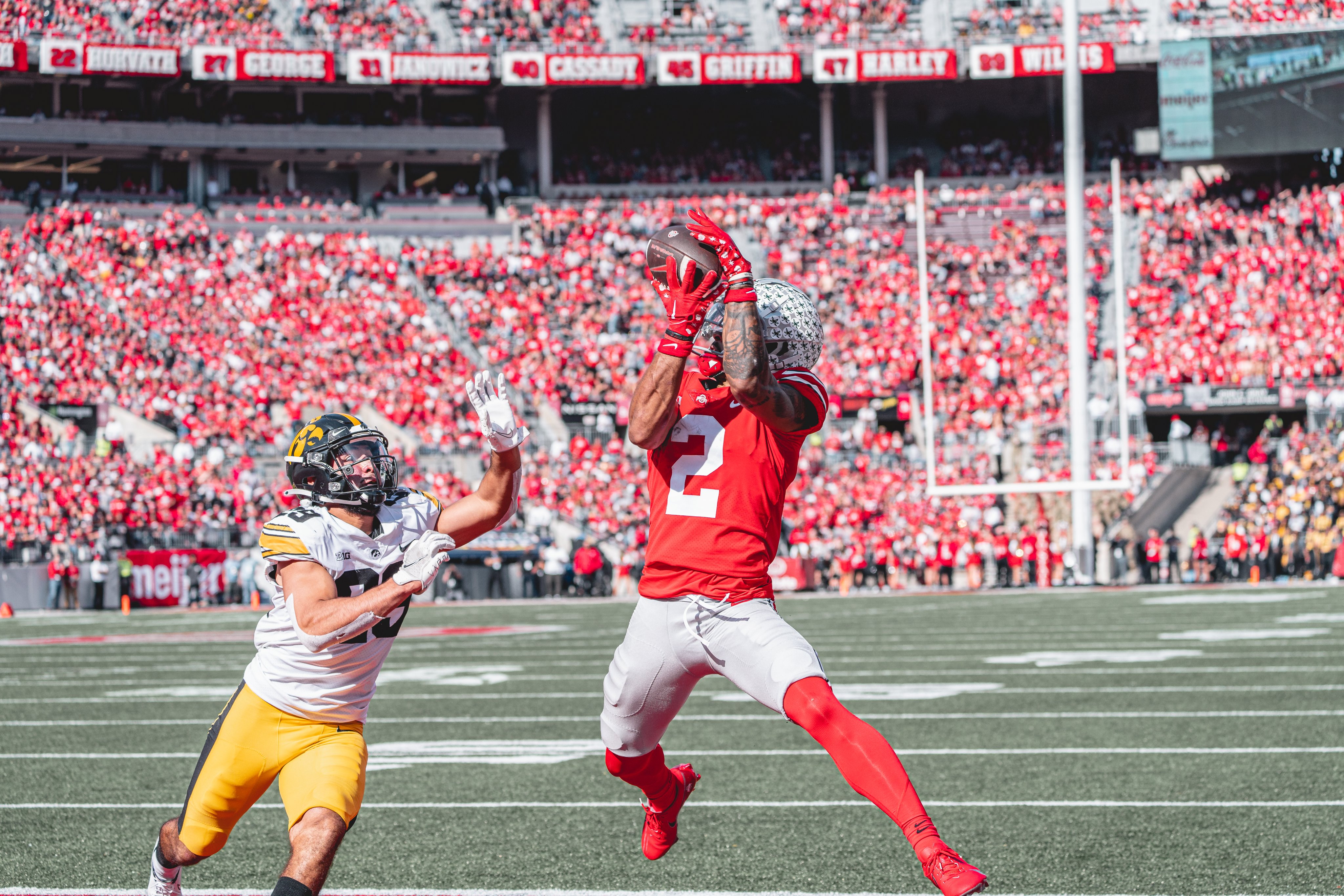 Ohio State WR Emeka Egbuka catching a football for a touchdown