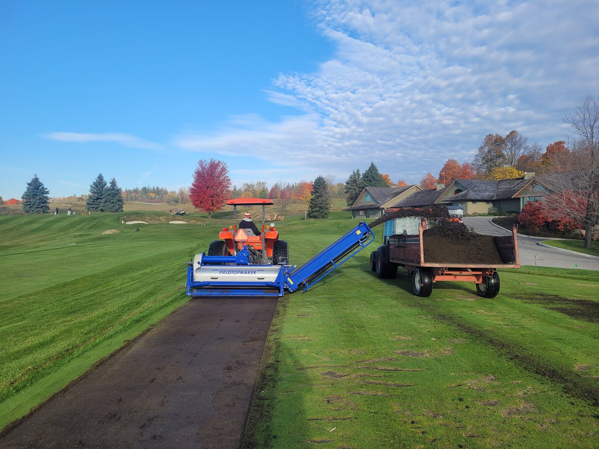 RobRwright's tweet photo. Range Tee resurfacing at both courses. Great efforts by @ZanderSod on Day 1. 32 years of divot mix requires a few passes to level out the surface https://t.co/KTesIeUTNO