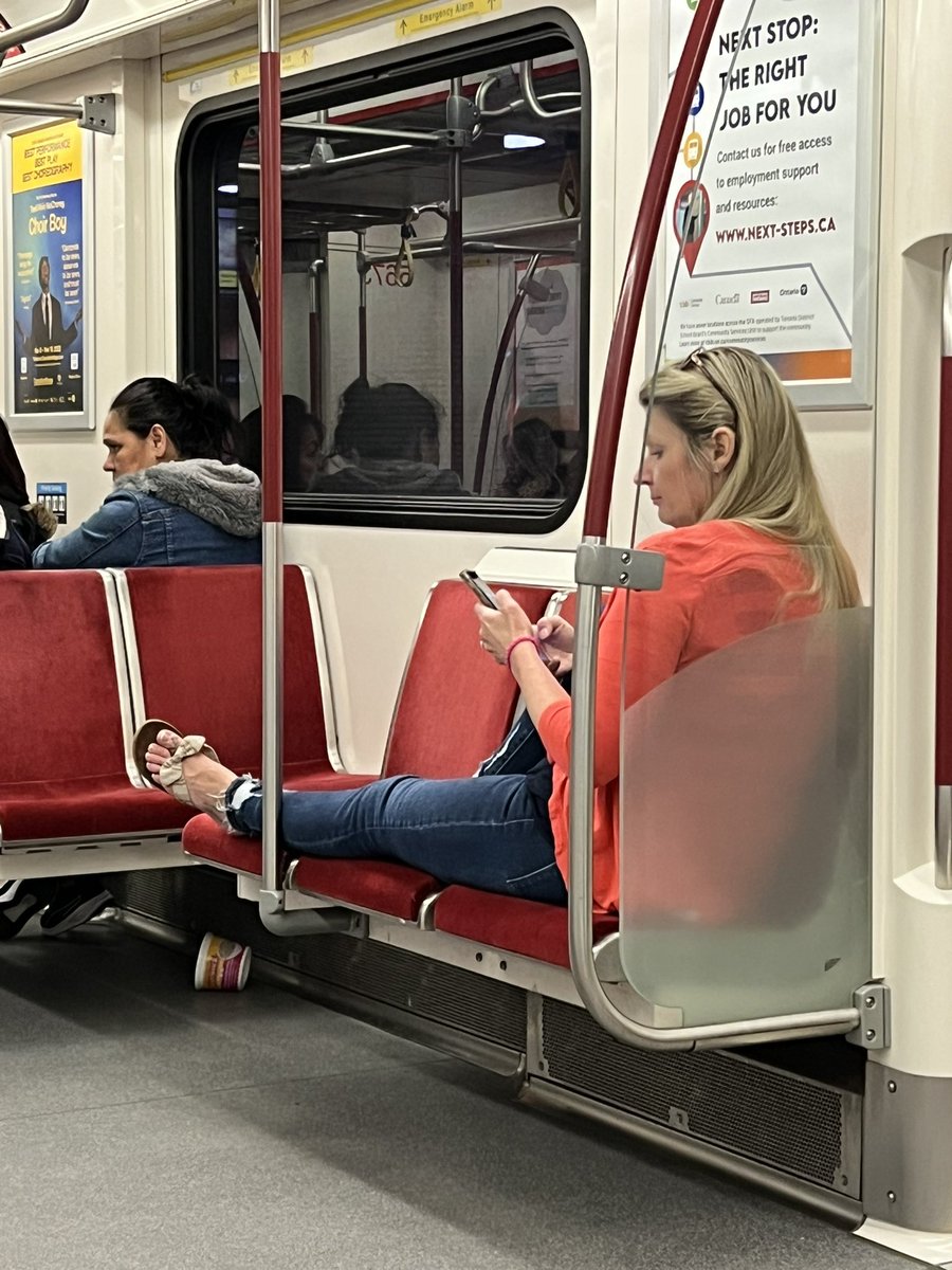 What a great example this woman is setting to her kids sitting across from her. Has everyone in #toronto collectively forgotten <a href="/ttc/">TTC</a> etiquette?!