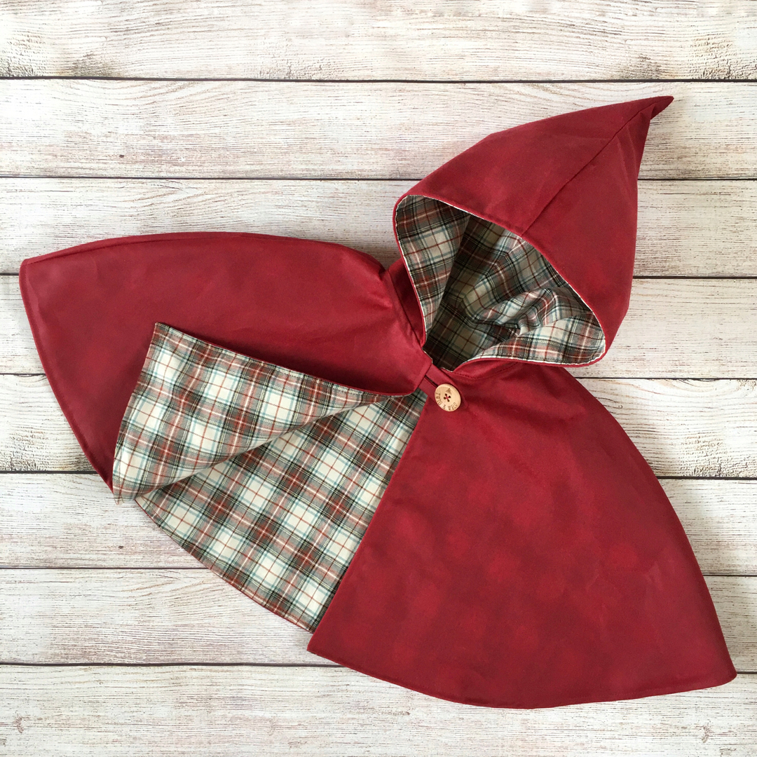 twigandwild's tweet photo. ❤️ Cape if the moment! Our signature waxed cotton pixie capes in ruby red, with a soft, slightly brushed Glenbarroch tartan lining have been very popular in the last couple of weeks. They’re shower resistant and ready for adventure! Channel those Little Red Riding Hood vibe https://t.co/ZZqgO9Mat6