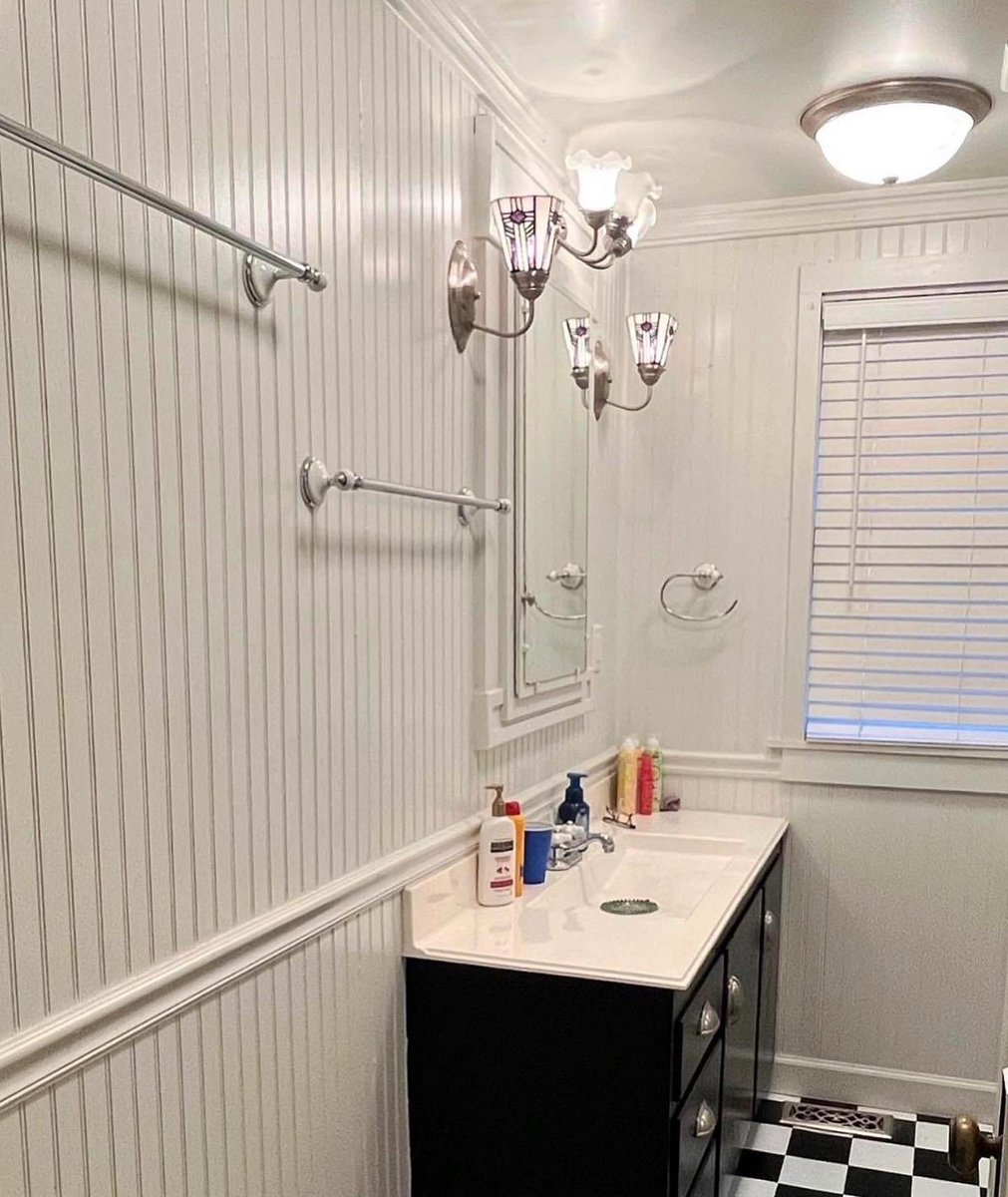 Quick little weekend project to improve the bathroom. It’s not totally finished - I’m planning on a fresh coat of white paint for the top half, updated light fixtures and adding some missing trim pieces - but it already looks so much better! #AdventuresOnAtchison