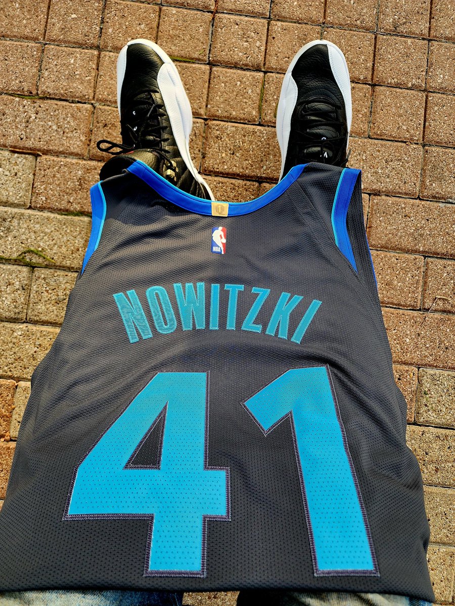 scrmblnscholar's tweet photo. Heading out to catch the Mavs Home Opener with @chkenman - I had to make sure I brought out the heat with me. Dirk Nowitzki's 2018 City Authentic jersey. #MFFL #TrueMaverick https://t.co/MwRtYdGlGp