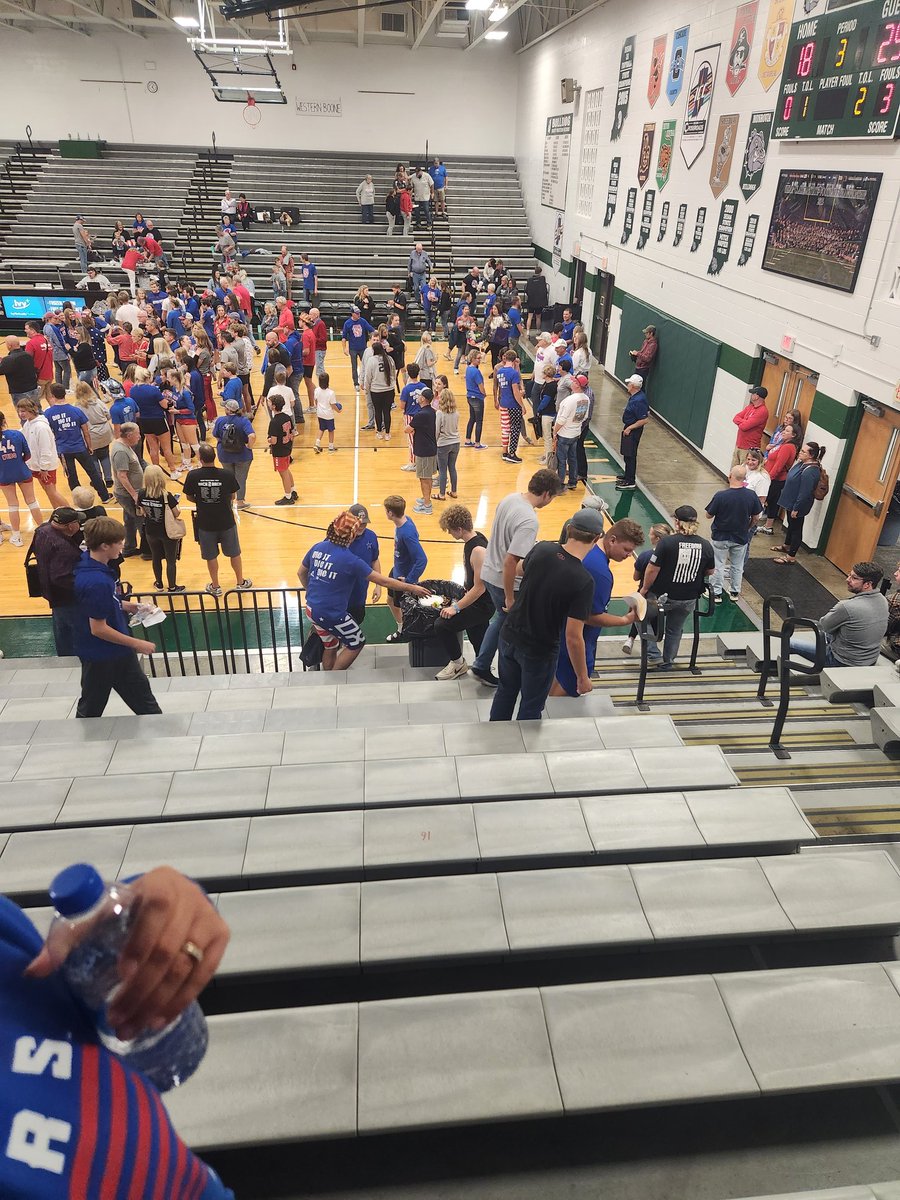 CraigConyer31's tweet photo. Minutes after @WeBoVolleyball_  wins Regionals @WeBoFootball players and others cleaning up the stands. It's what we do #gostars https://t.co/hmoUTeBuYl