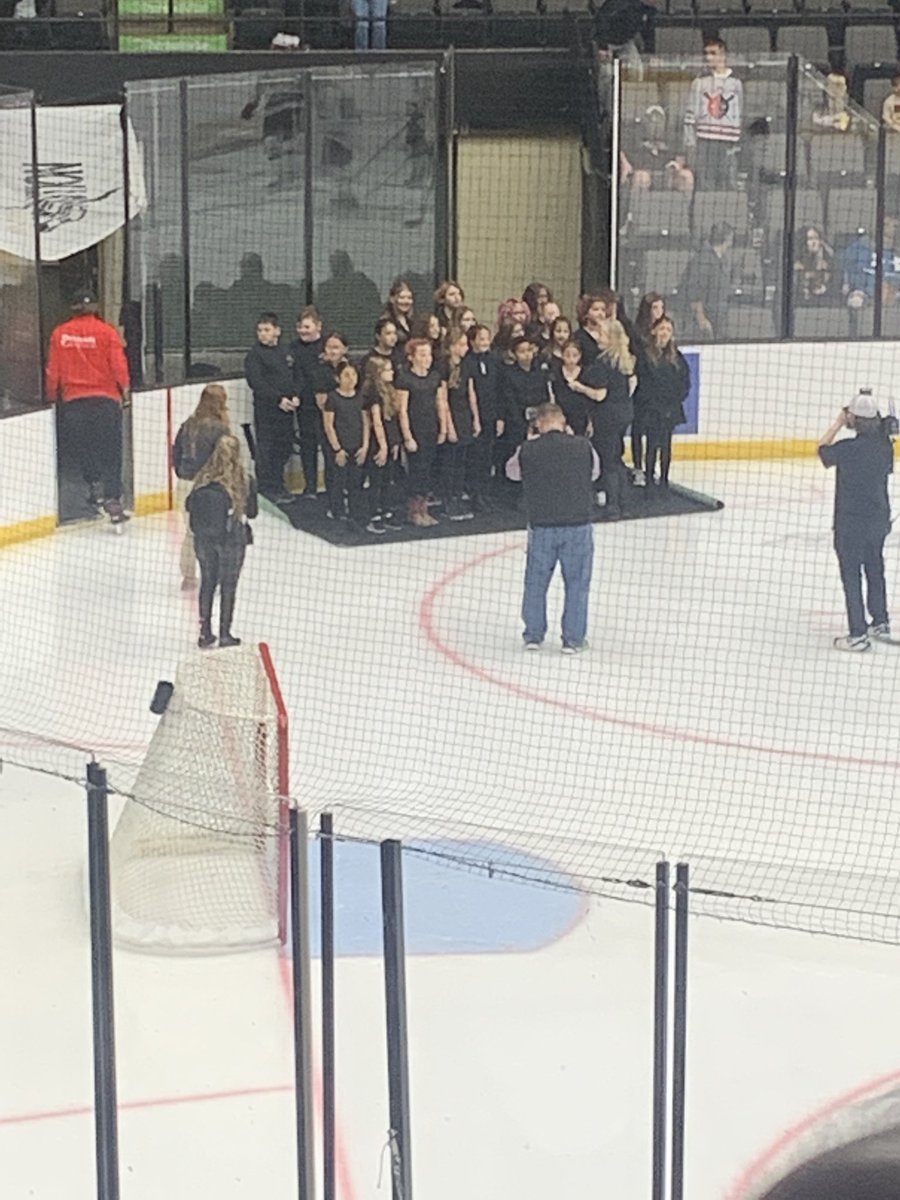 BellaireMiddle's tweet photo. Mrs. Hawkins and the BMS Show Choir, The Note-Ables, sang at the Wheeling Nailers game tonight!  Awesome work, Big Reds! ❤️🖤 https://t.co/p4ol4p8h08