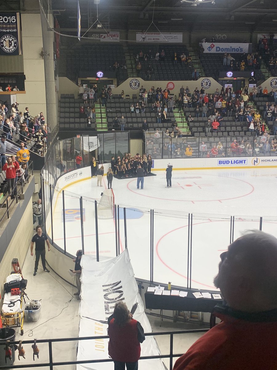 BellaireMiddle's tweet photo. Mrs. Hawkins and the BMS Show Choir, The Note-Ables, sang at the Wheeling Nailers game tonight!  Awesome work, Big Reds! ❤️🖤 https://t.co/p4ol4p8h08