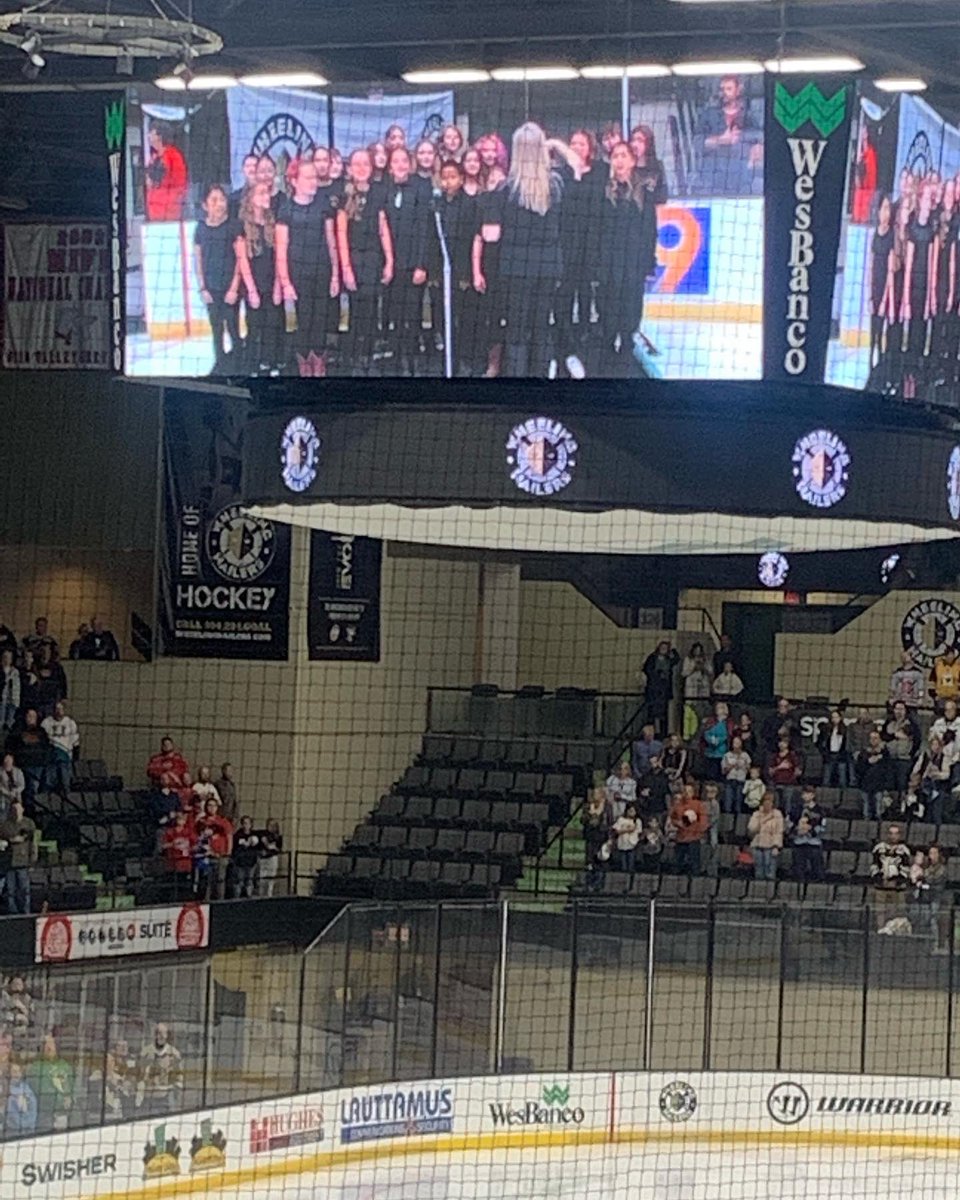 BellaireMiddle's tweet photo. Mrs. Hawkins and the BMS Show Choir, The Note-Ables, sang at the Wheeling Nailers game tonight!  Awesome work, Big Reds! ❤️🖤 https://t.co/p4ol4p8h08