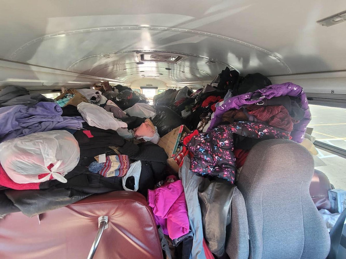 PCFAMichigan's tweet photo. g a place for the giveaway.    Thank you to our helpers from Tri County, Simon Insurance, and the PHS NHS for unloading the bus and sorting! 
The food was donated to the Portland Food Bank, and the extra coats/clothes went to area organizations in need. https://t.co/nsDeYUwnq8