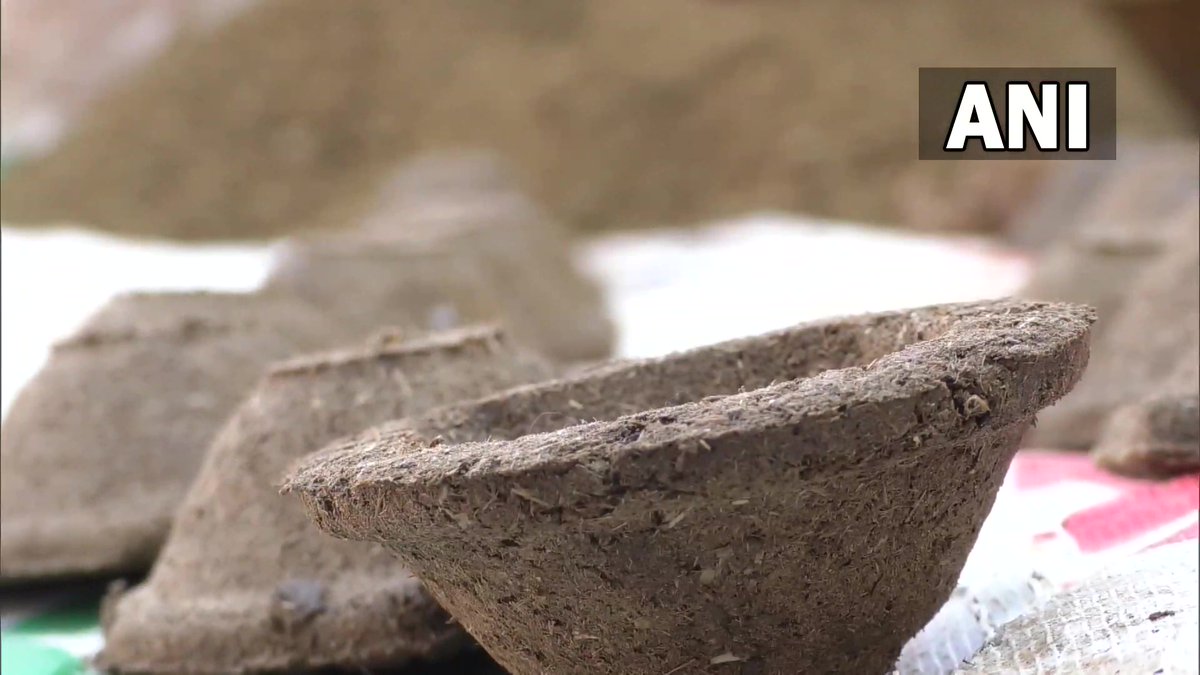 ANI's tweet photo. J&amp;K | Women in Udhampur make eco-friendly diyas from cow dung ahead of Diwali, promote PM's Vocal for Local initiative https://t.co/2vG7490uq6