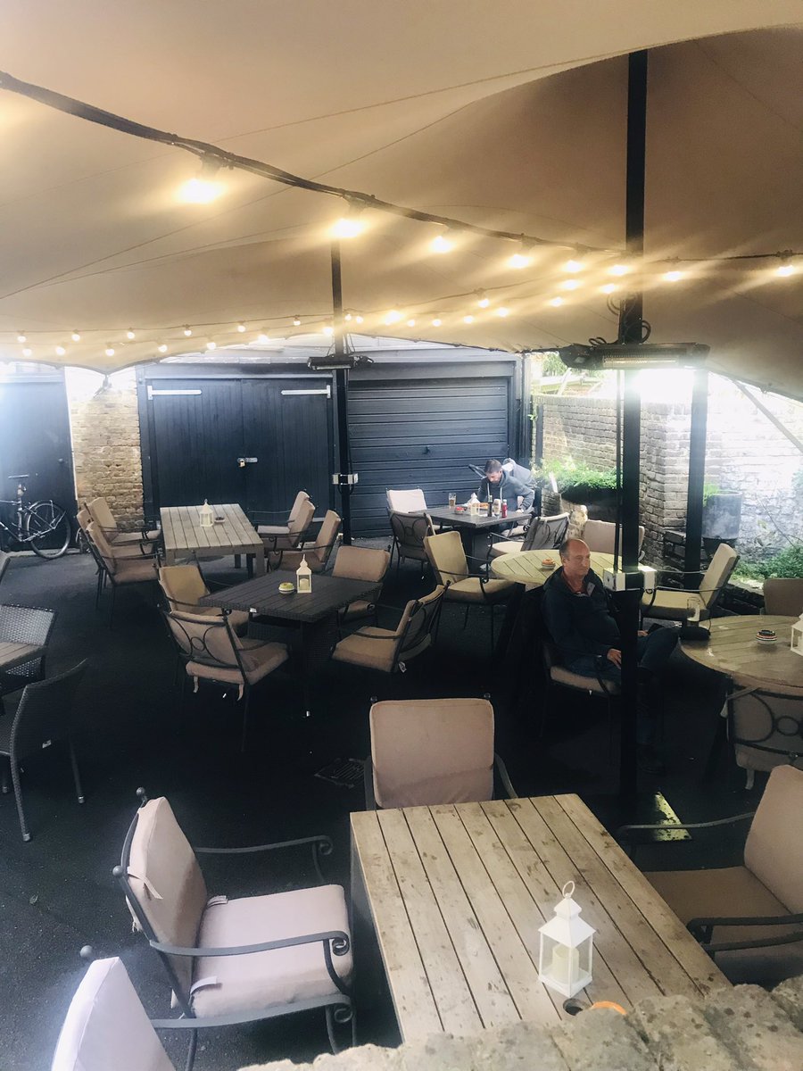 hare_hounds's tweet photo. It’s been a busy week getting ready for Winter as we welcome back our stretch tent. Heated, lit &amp; decked with comfy cushions, snuggle blankets &amp; hot water bottles. Winter is officially our favourite season #stretchtent #winterfication #extraseating #cozy #takeaseat @youngspubs https://t.co/JAl84fv9di