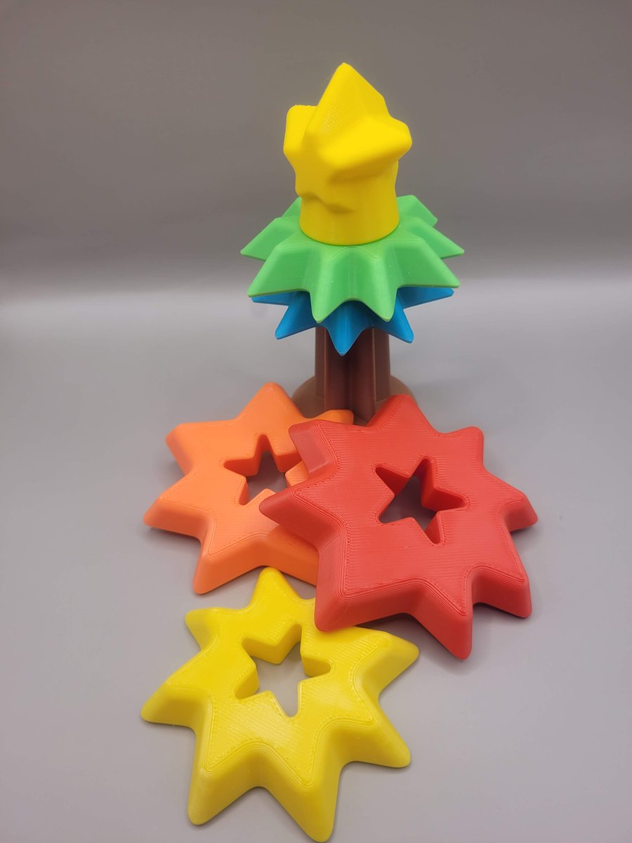 FennekDesign's tweet photo. Redid the scaling of my stackable Christmas tree toy to make it swallow-proof and did a test-print. The color choice looks great in my opinion. Just the star could be in a different color, maybe. Just need to check for toy-safe material now.

#Christmas #Toy #3Dprinting https://t.co/ZQdmd7Uqea
