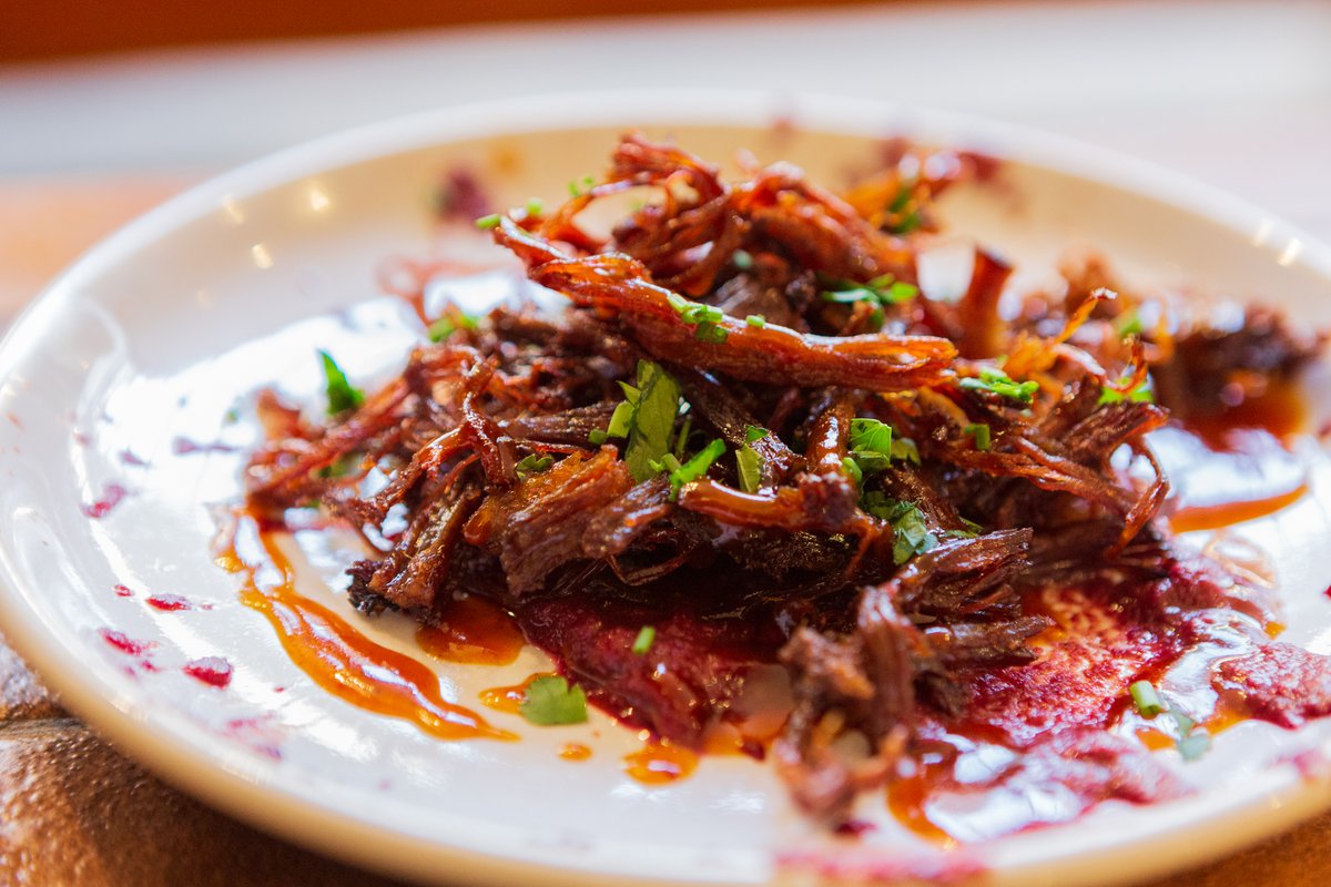Krisket
Another delicious bar snack available from 12pm daily here at The Crown 👑
Pulled smoked brisket, fried till crispy &amp; spun through house Carolina sauce, teamed with a red cabbage ketchup