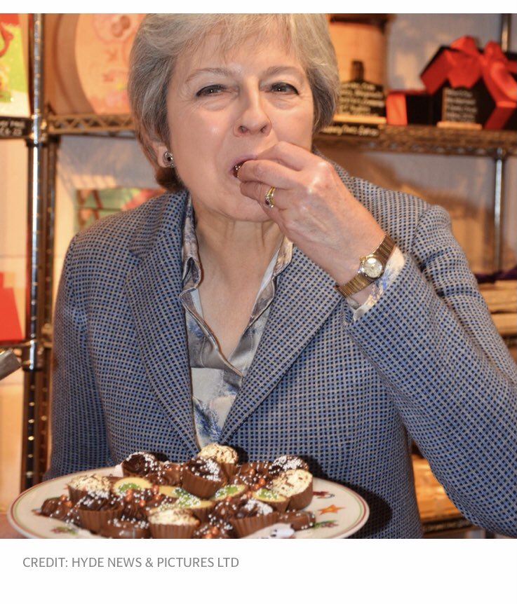 Pix of the day — Theresa May living her best life as she opens a chocolate shop in her constituency 🍬