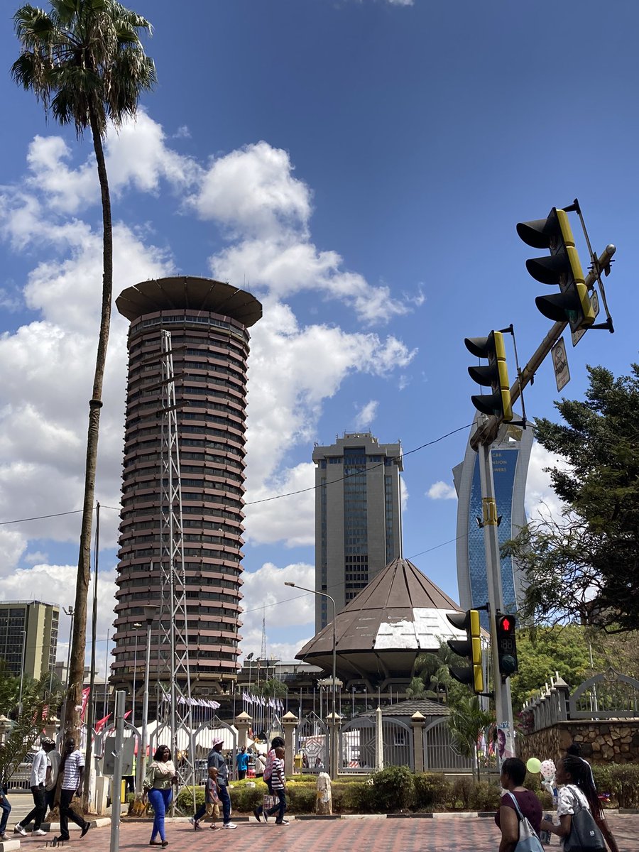 Sunday morning walk visiting #Nairobi CBD. Touring @KenyaRailways_ museum (incl. Jacarandas!), August 7th Memorial @MemorialParkKe, @KICC_kenya (stunning view from helipad and excellent coffee downstairs) and streets around Parliament and ministries.