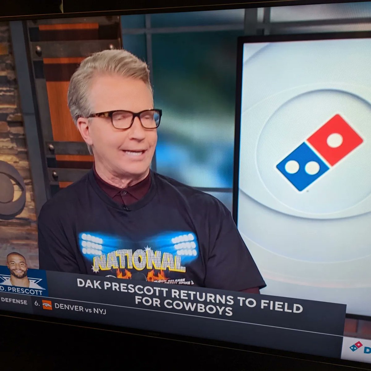 ArtHistoryAmy's tweet photo. @NFL @CBSSports Please, please, please continue to celebrate "position player days" by having analysts wear t-shirts over their dress clothes. #NationalTightEndDay https://t.co/H4kKU62StC
