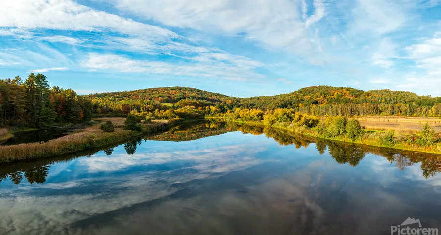 steheap's tweet image. Ottauquechee river calmy flows across the Vermont countryside in the autumn. GET it here: buff.ly/3eNVLIv #BuyIntoArt #Quechee #Fallcolors