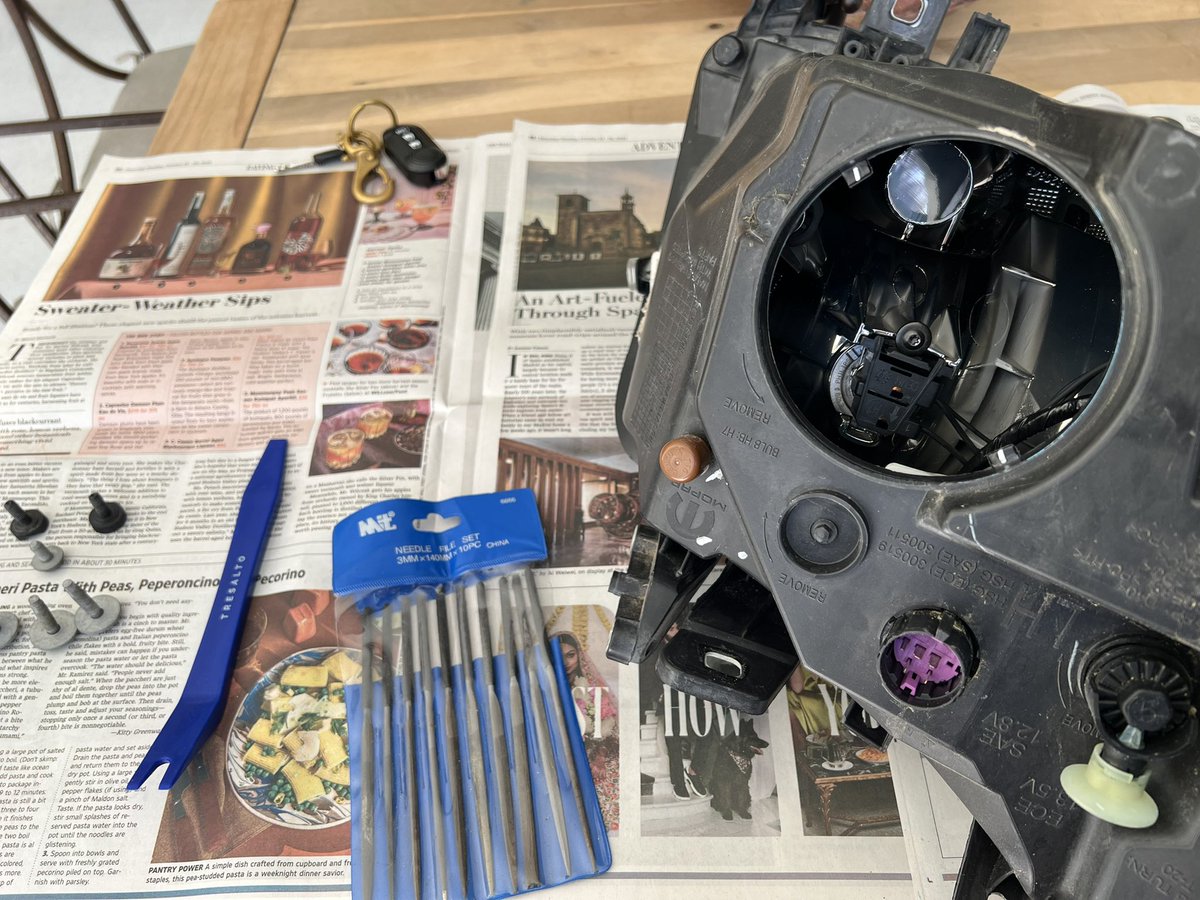 AndrewBohrer's tweet photo. Now the Ram Promaster has notoriously bad headlights. 

But you can often fix them by using a needle file to clean up the leads meet the bulb. 

And as auto expert @mdkrigbaum points out on my work surface, that’s enough savings to buy really fancy damson plum eau de vie. https://t.co/eEGbEpt6lN