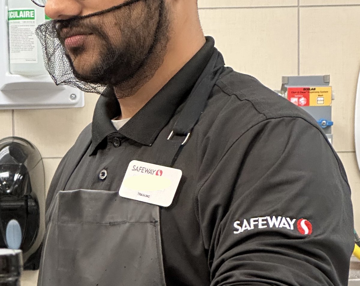 OrangeHazMat's tweet photo. And the Oscar for Best Performative Face Mask goes to this deli worker with a hair net over his mouth. Extra points for not even bothering to cover his nose. https://t.co/mra8evVhep