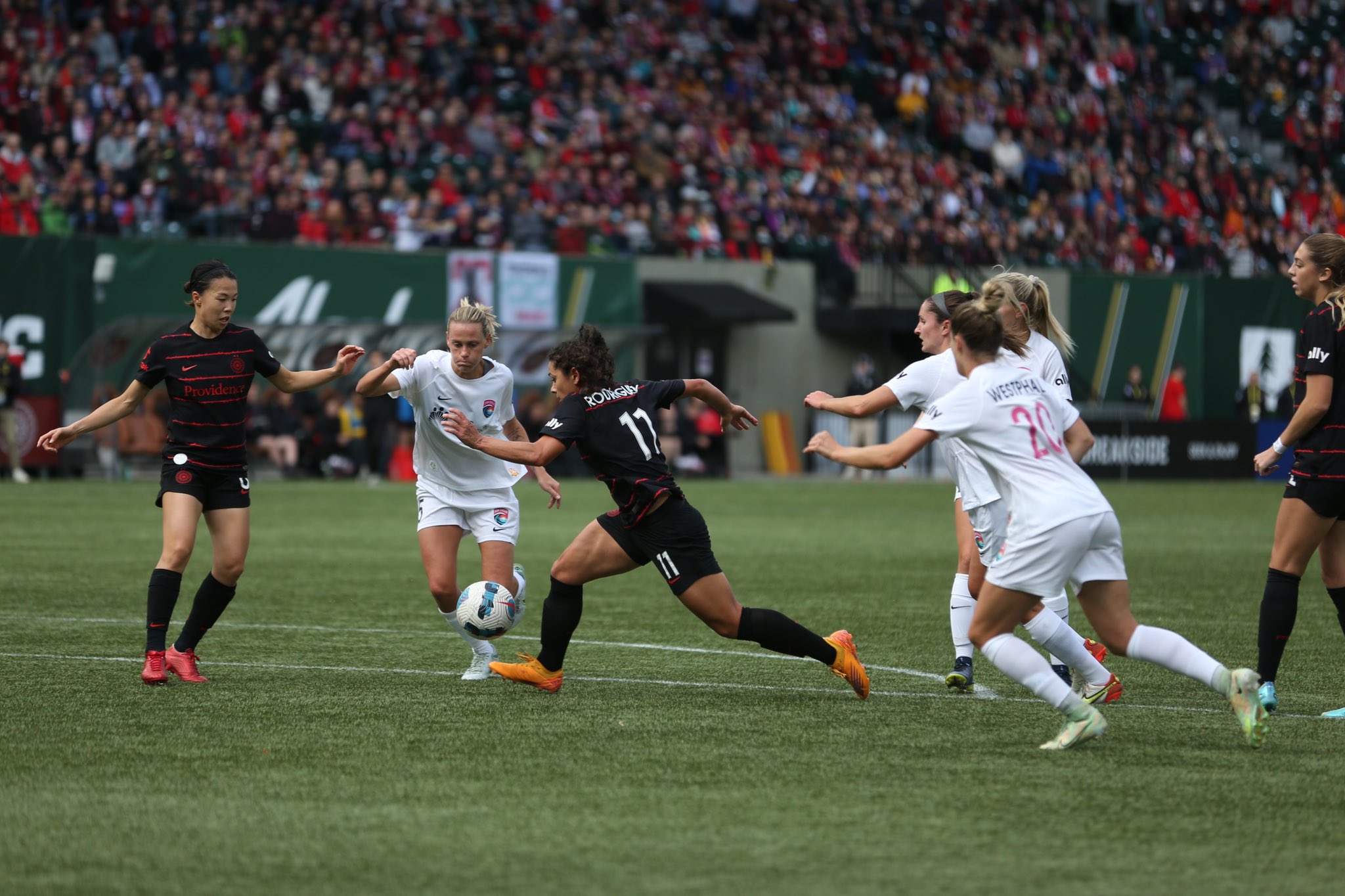 Rocky dribbles the ball down the field