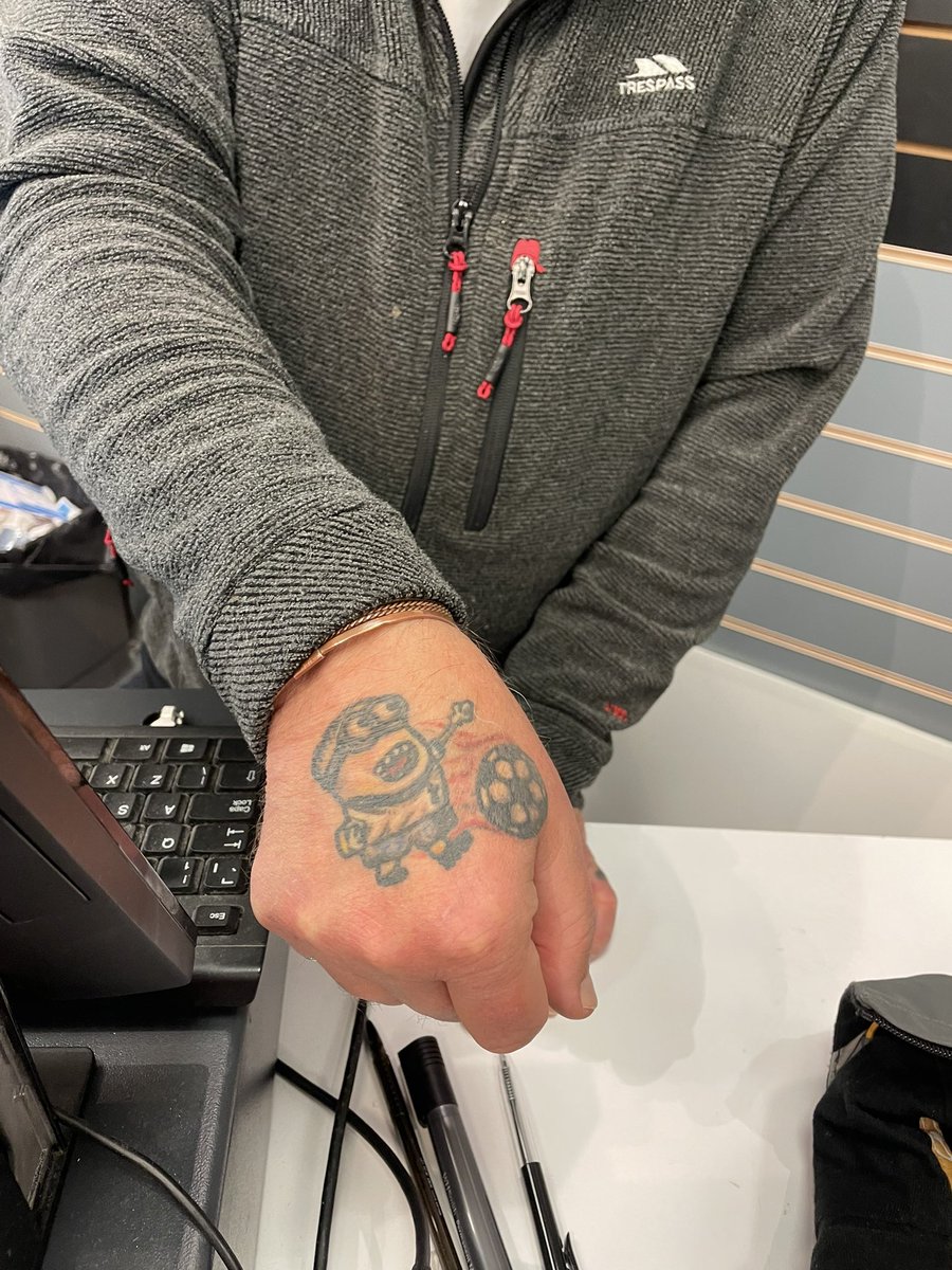 ihatetomaustin's tweet photo. Just went to spud the guy behind the till and he had the minion Spurs tat, imagine showing this pic to someone in 1934, they’d bloody love it https://t.co/bT1kxPgiPo