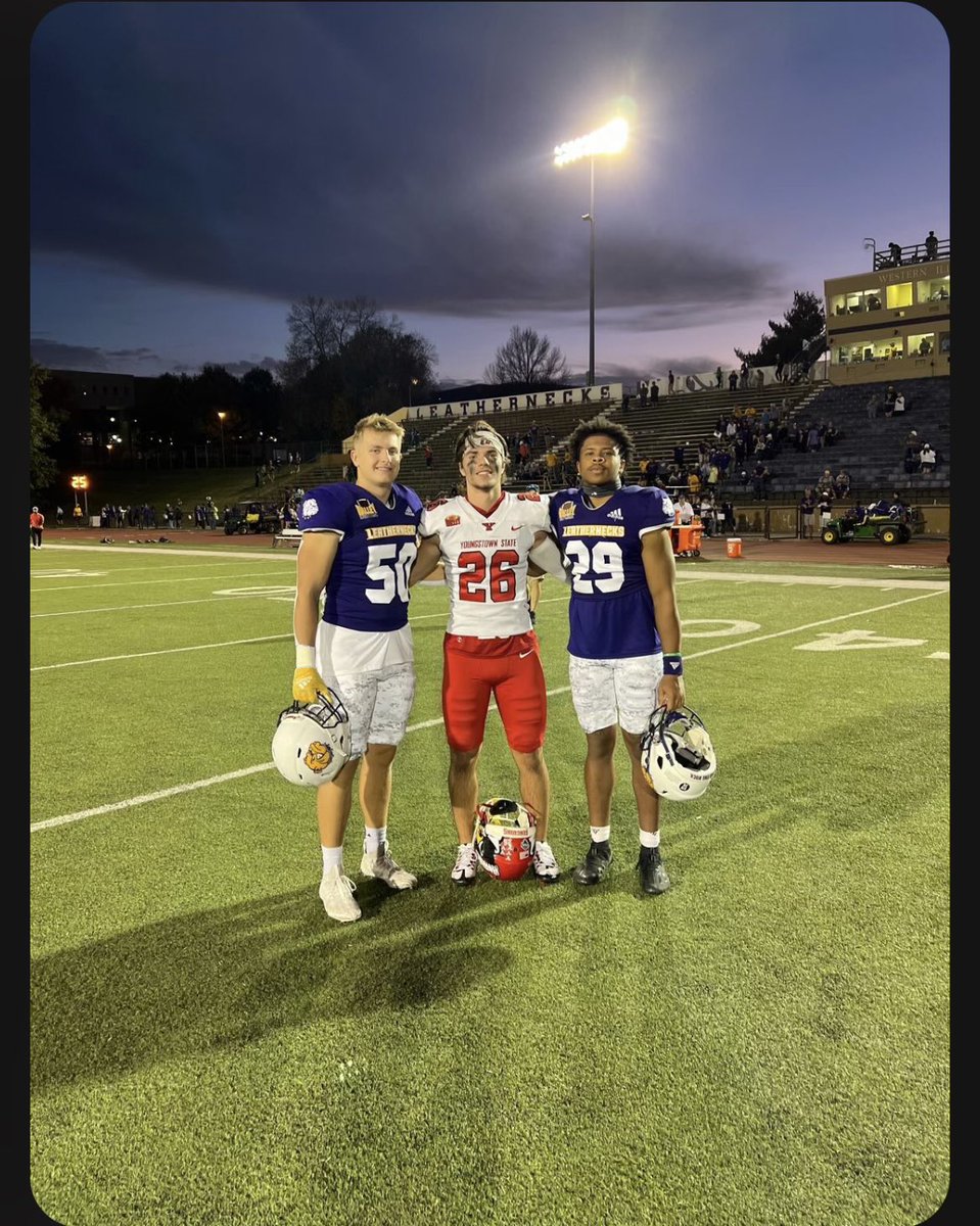 Former Griffins meeting on the college gridiron. 
Adrian Wilson Bowling Green, Jack Tremblay Central Michigan, Jamal Johnson Bowling Green. Mike Cardilli WIU, Max Tomczak YSU, Kamal Mukarram WIU