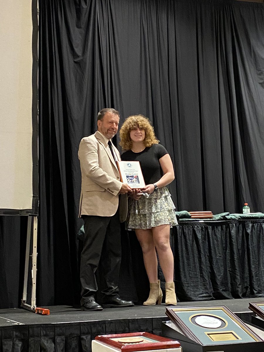 PHSouthWrestle's tweet image. Congrats Maddie Kubicki!!!! Coach Rosario presents her with the Female Athlete of the Year honor from the Missouri Chapter of The National Wrestling Hall of Fame!!!