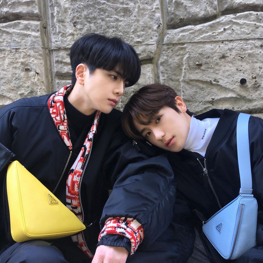 Youbghoon's tweet photo. What is much better than taking photos with a Prada Triangle bag? It is to take photos with the bag together with your boyfriend! Surprise, The B! Instead of Juyeon, I luckily paired up with Jaehyunie this time! It's a fate, to say at last. https://t.co/Cg0vRjyNcU