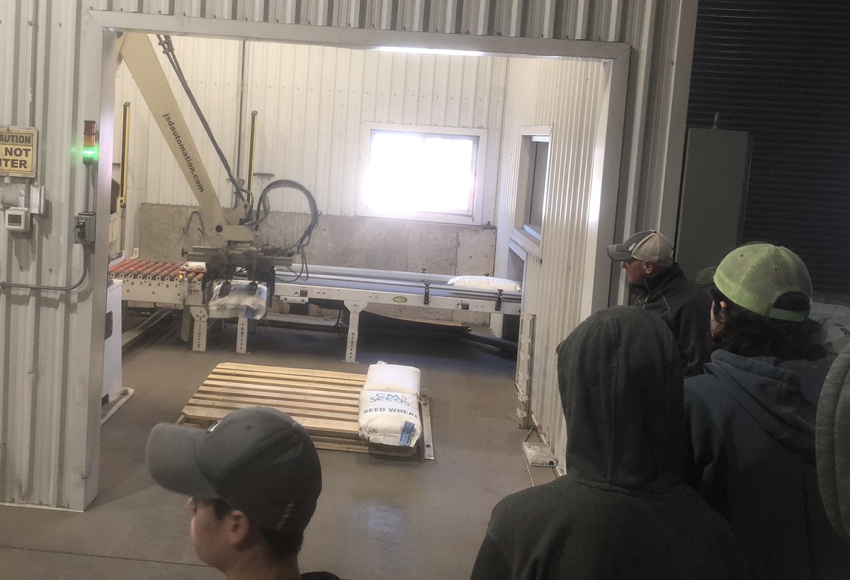 Students see first hand the technology used in agriculture. Robot  stacks bags of wheat at C&amp;M Seeds. We toured wheat plots and learned about all things Ontario wheat. Big thanks to Rob, Mike, Kevin.