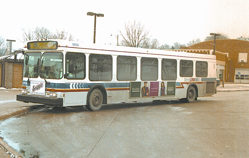 A cold fall day looked a little different a few decades ago. Can you guess when this #MetroQC bus was driving through town? 
Hint: "I'm the king of the world" was the catch phrase from a big boat movie that year!