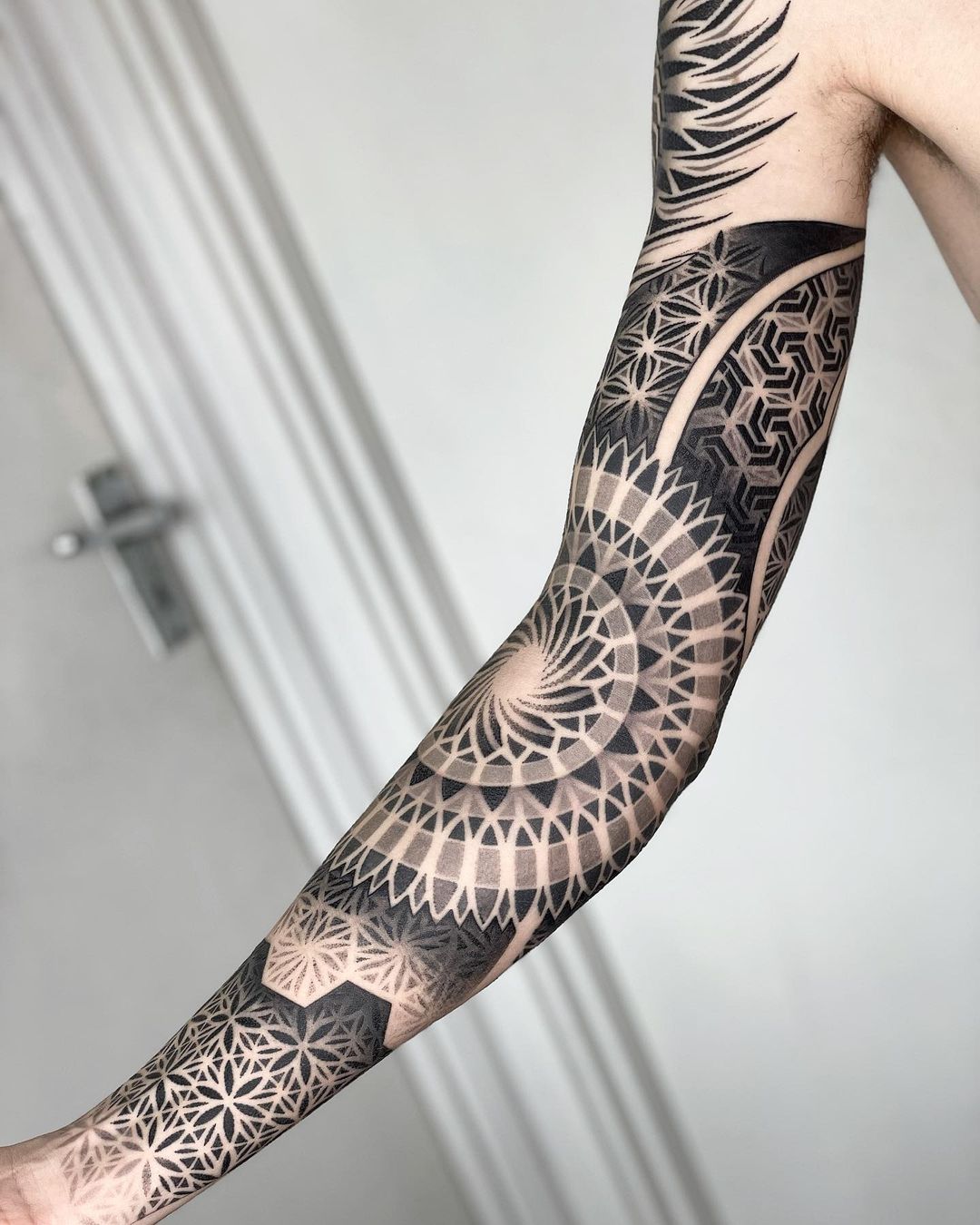 Tattoo uploaded by Tattoodo • Blackwork tattoo sleeve by Samuel Christensen  #samuelchristensen #blackwork #geometric #southpacific #maori #polynesian  #samoan #tribal #dotwork • Tattoodo