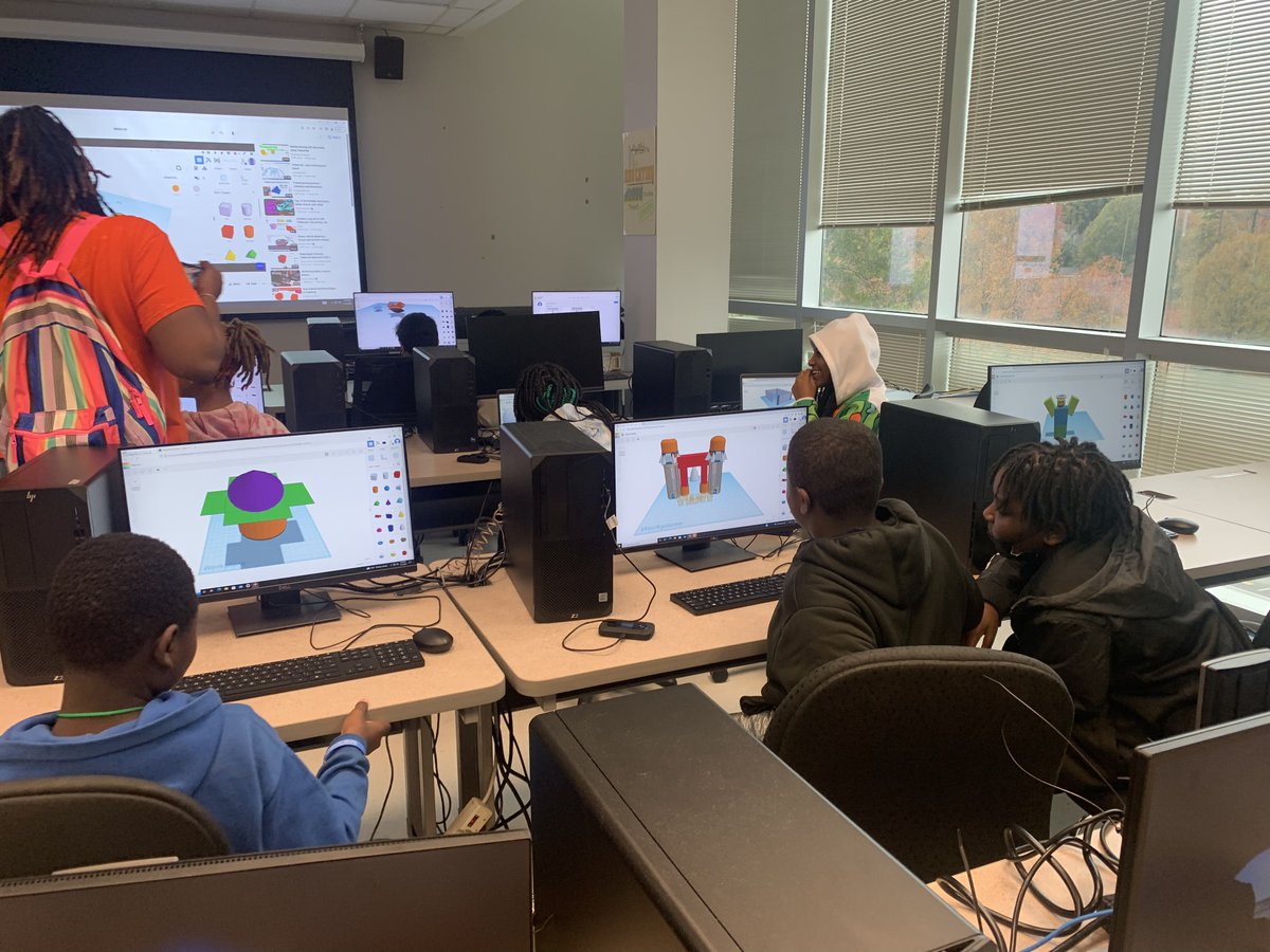 NCAT_VIL_MM's tweet photo. #NCAT Wellness Day Fall 2022: The present inspiring the future. #GCS @SwannMiddle School students enjoyed a day of 3D design, robotics, and coding activities, a stem career game and discussion with a campus tour led by #NCAT #STEM college students. #VerizonInnovativeLearning https://t.co/hYPthoSKHy