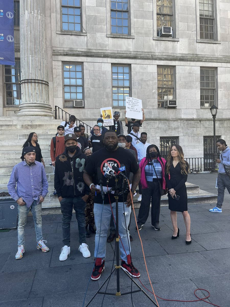 ScottPaltrowitz's tweet photo. Getting started: The family of Saheed Vassell is holding a press conference to demand Lee Zeldin take down his racist, dishonest ad. The NYPD killed Saheed in 2018. Zeldin’s ad uses Saheed’s final moments to falsely perpetuate racist fearmongering. His family wants it taken down. https://t.co/Mr6ToQxwGH