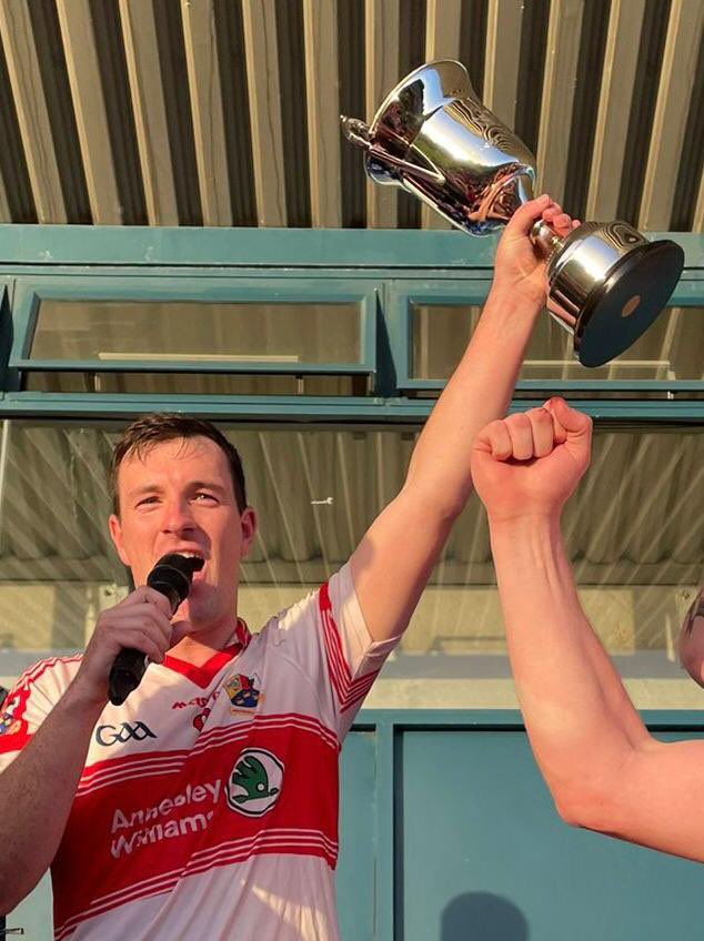 DubGAAOfficial's tweet photo. Champions! @WColmcille captain Niall O’Connor lifts the @GoAheadIreland DSH2 championship cup. Commiserations to @FaughsGAA #GoAheadDSH2 https://t.co/bVUxvY1DFX