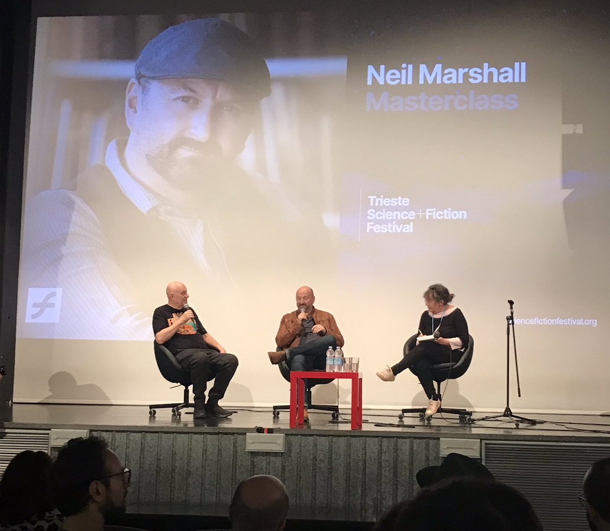 FilmFan1971's tweet photo. Writer-director Neil Marshall, on stage for a masterclass with @alanfrightfest at @tsplusf, after a 20th anniversary screening of Dog Soldiers. #tsplusf https://t.co/sLc2Tu7kuk
