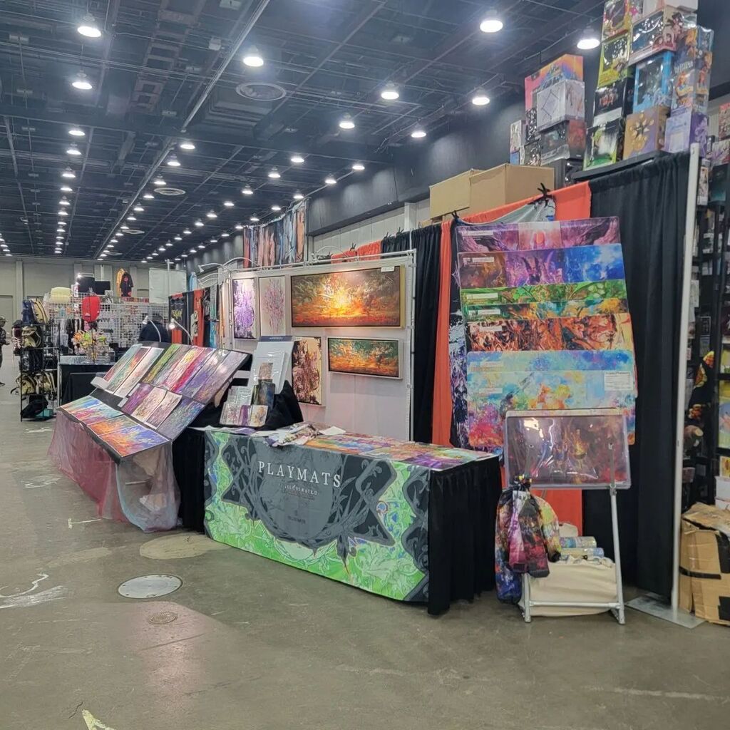 Puillustrated's tweet photo. @youmaconofficial day 2!

We are at booth E 34-36. 

It is so wonderful to be back at this fun filled festivity again. Come find us as we have a bunch of new mousepads, deskmats and larger than life size artwork. 😅

#puillustrated #youmacon #fantasyart #mousepad #deskmat #pl… https://t.co/BL1XB9oyM8