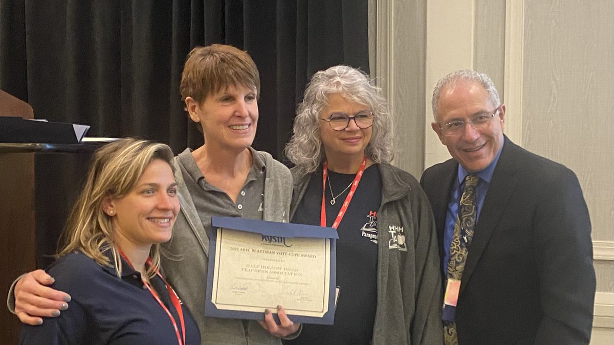 NYSUT President ⁦<a href="/AndyPallotta/">Andy Pallotta</a>⁩ presents Vote Cope awards to Half Hollow Hills and several other SRP locals at the 2022 NYSUT School Related Professionals Conference.