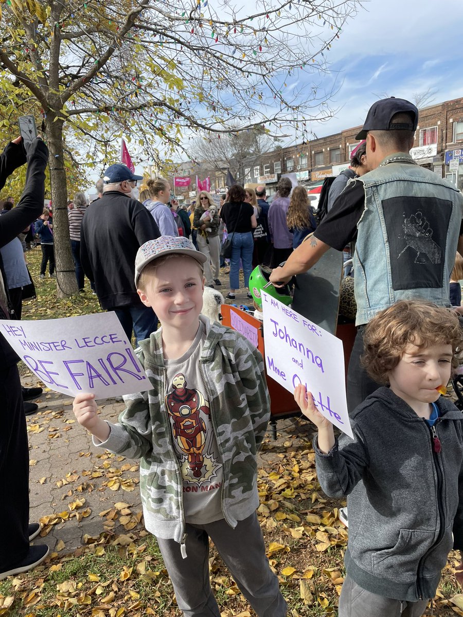 fodley's tweet photo. Protesting isn’t ‘illegal’ yet! It was great to see students, colleagues, neighbours, and these two dudes out for #CUPESolidarity today. @Sflecce and @fordnation, listen up! #39kIsNotEnough https://t.co/Qfi5JcURz9