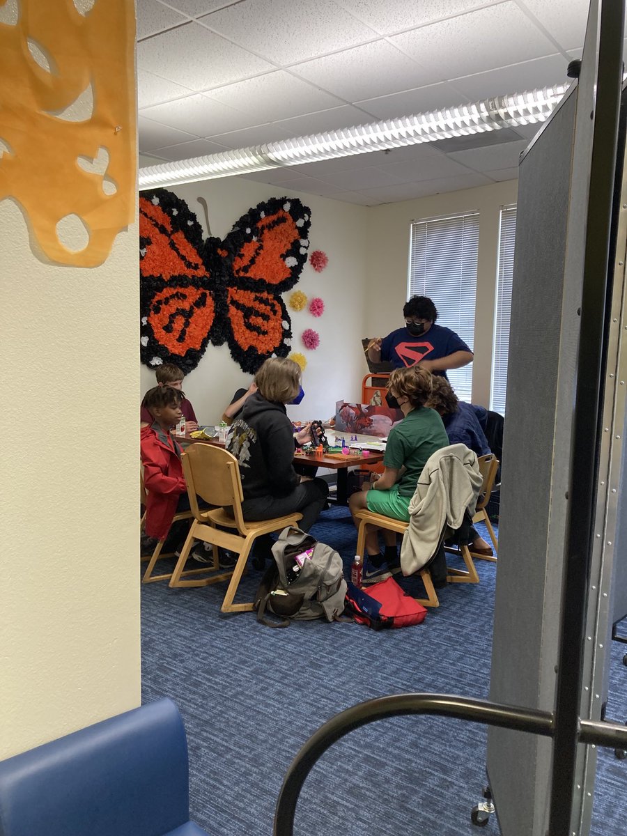 Stopped by my work branch doing errands & came across this adorableness. Our DnD group. Vic, the Dungeon Master, grew up coming to our library. Volunteered doing DnD groups for teens & now he works for us. I ❤️ libraries today. 
#PublicLibraries
#InternationalGamesMonth #DnD