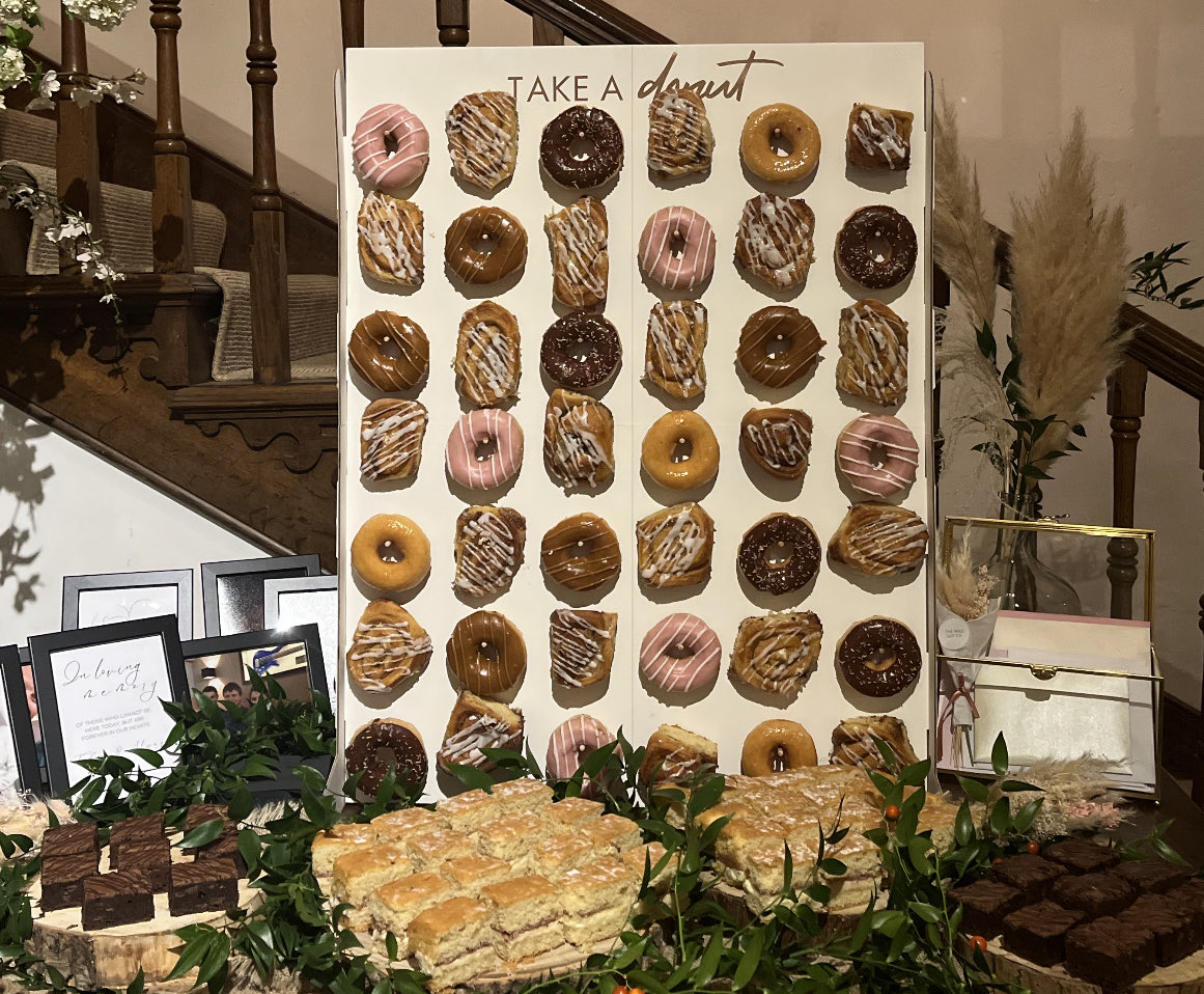 Donut and cinnamon bun wall - #weddingcake alternative! ⁦<a href="/Pennard_House/">Pennard House</a>⁩ #Abbey&amp;Andy #wedding