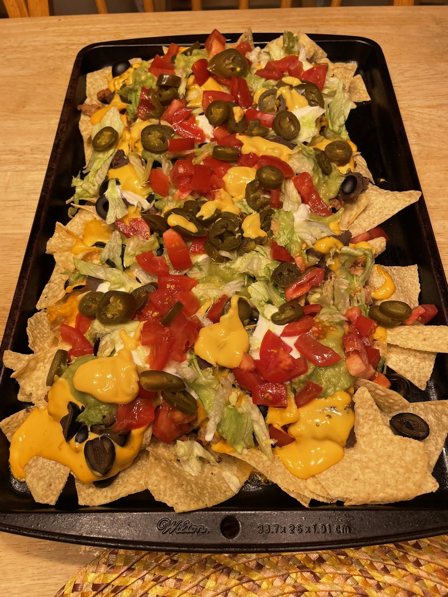 DelbyMom's tweet photo. When you and your hubby say nachos are a good dinner option! 😂. Touchdown Notre Dame☘️ https://t.co/pW0kh9O435