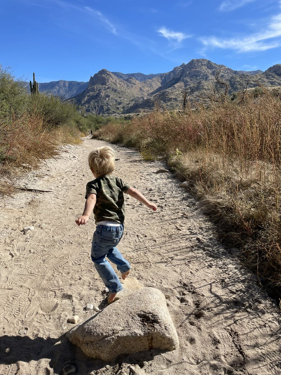 “Hiking” in the desert with my son.