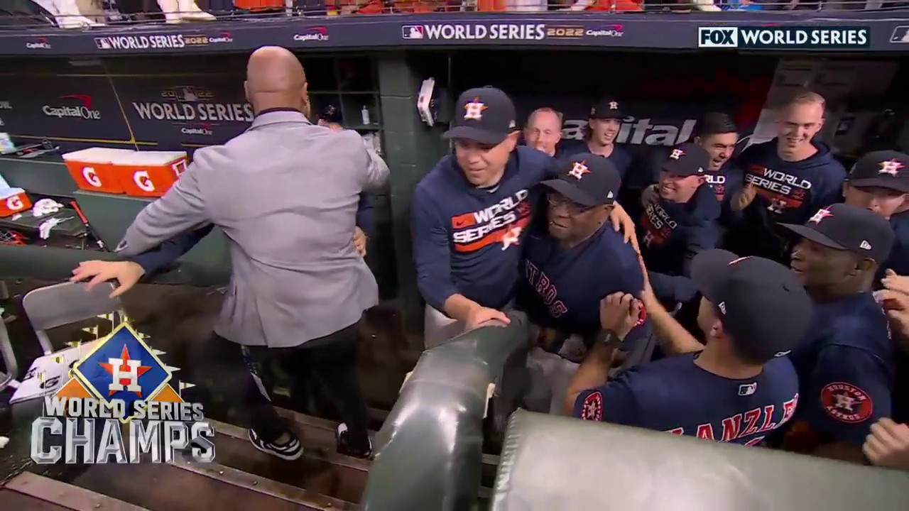 Astros Players Swarm Dusty Baker After He Captures First World Series Title  - Sports Illustrated