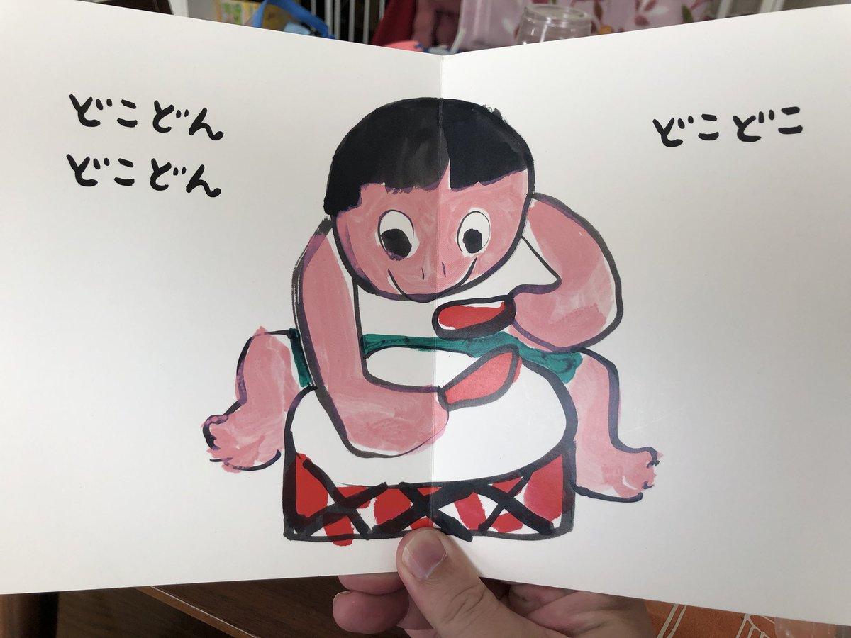 traditional media holding drawing photo inset child drawing black eyes smile  illustration images