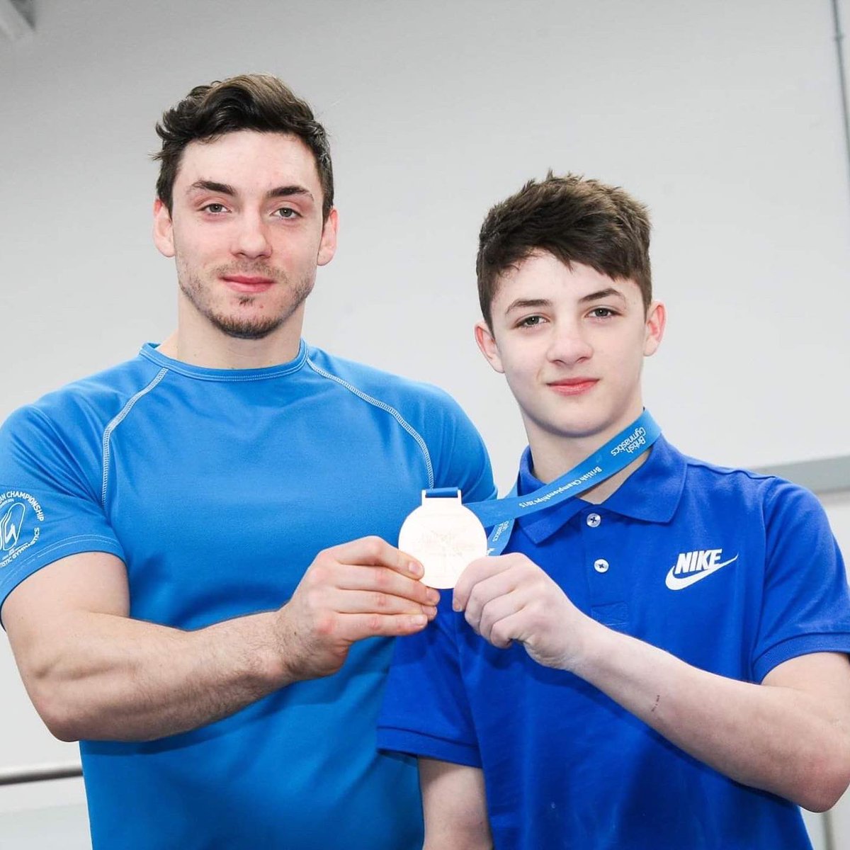 McClenaghanRhys's tweet photo. To my coach and friend Luke. We did it. If it was anybody else I wouldn’t be here. We had to be the outliers to achieve greatness. People dismissed our ambition and even stood in our way but we rose above it every time until we were on top. World Champions forever🥇 https://t.co/veNRZJYLIu