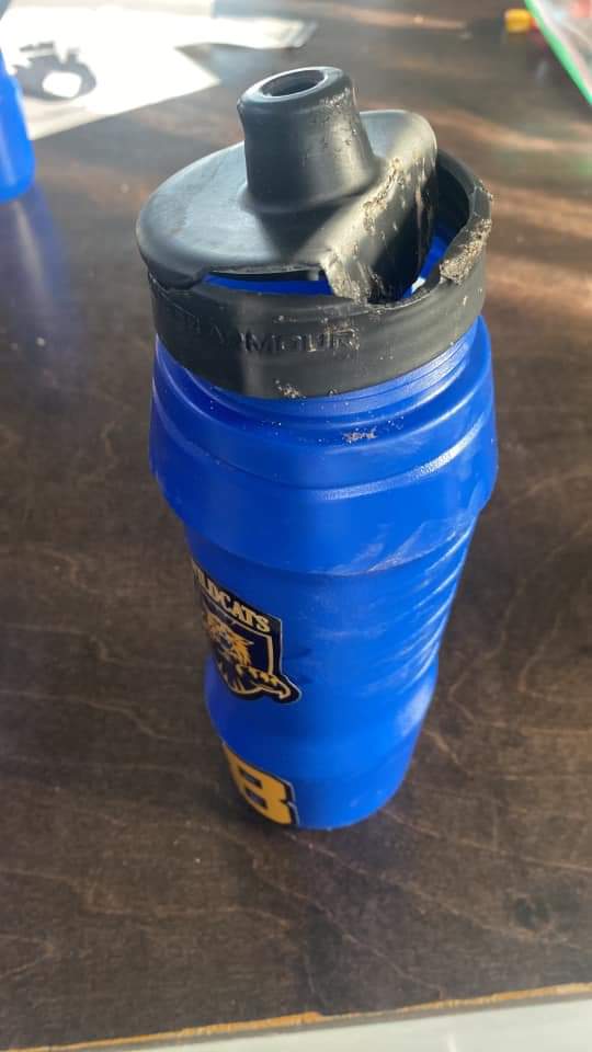 DuncanLivestock's tweet photo. Hey @UnderArmour, check out how well your water bottle did after it got away from my daughter at a fundraiser for the local food banks. Unfortunately, the wind blew it across the highway and a dump truck drove over it. Other than the cover, it did pretty well. #midislewildcats https://t.co/qN5WcGBNg5