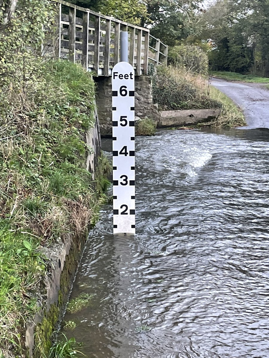 Jlangt's tweet photo. @ShropCouncil Just to underline the serious problem with the new flood markers at Strefford ford. They give wildly different readings and both are inaccurate. These were taken at the same time. https://t.co/TG6ZcfpcOz
