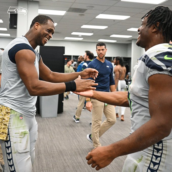 Geno and Ken in the locker room. 