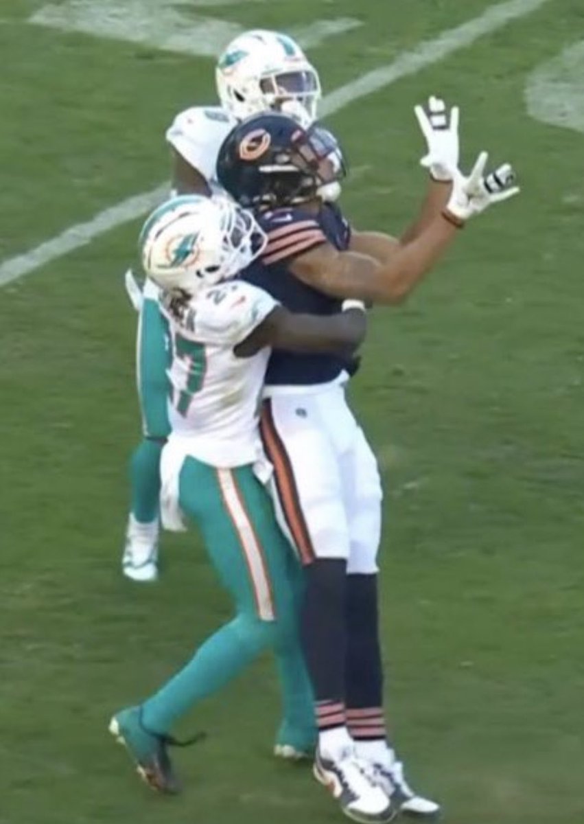 83nation's tweet photo. @Gaige_Rage @DannyScharba @ChicagoBears How is he supposed to high point the ball with a defender wrapped around his waste? https://t.co/MFruQmAwAq