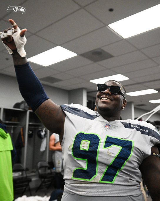 Poona ford in the locker room vibing.