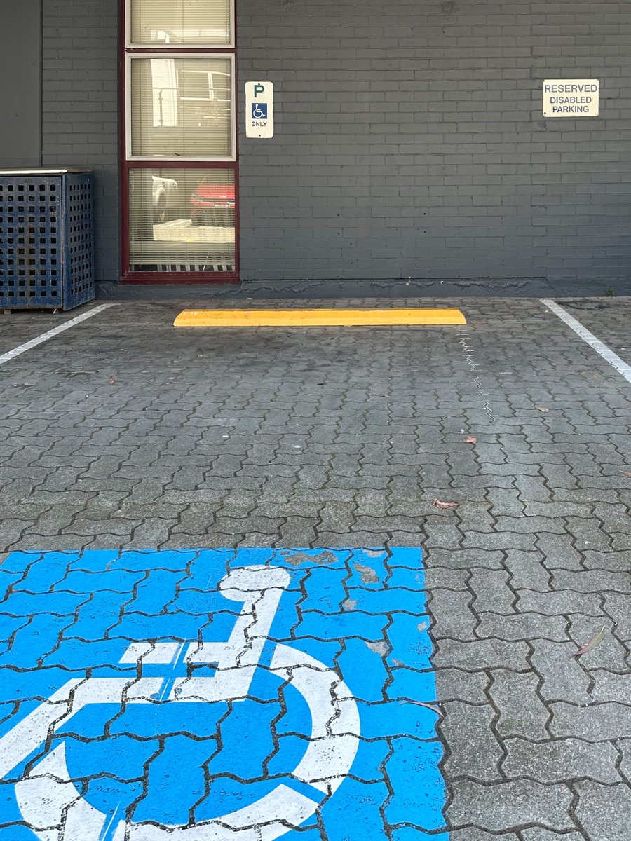Signage for accessible parking spaces varies widely in NSW, from old 'disabled parking' signs through to the guerrilla response (and subsequent adoption) of Sara Hendren's Accessible Icon Project stickers. How would you choose to sign them?